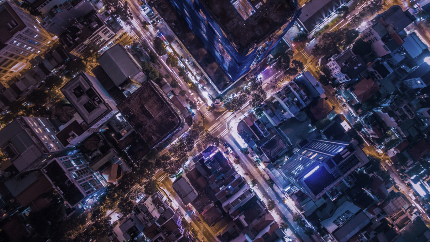 Illuminated-aerial-cityscape-at-night-Crocus-Thumbnail